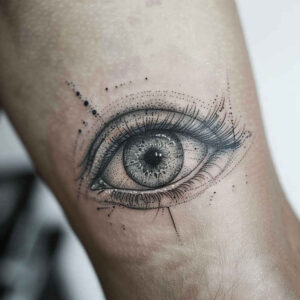 eyes tattoo design ideas bright color piercing endurance and power