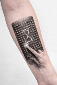 Forearm tattoo in black and grey, AI-generated concept, showing a dotted geometric panel with a pointing hand; cover-up ready.